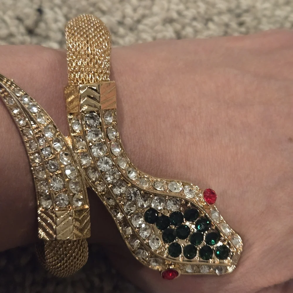 Elegant Gold Snake Bracelet with Green and Red Accents